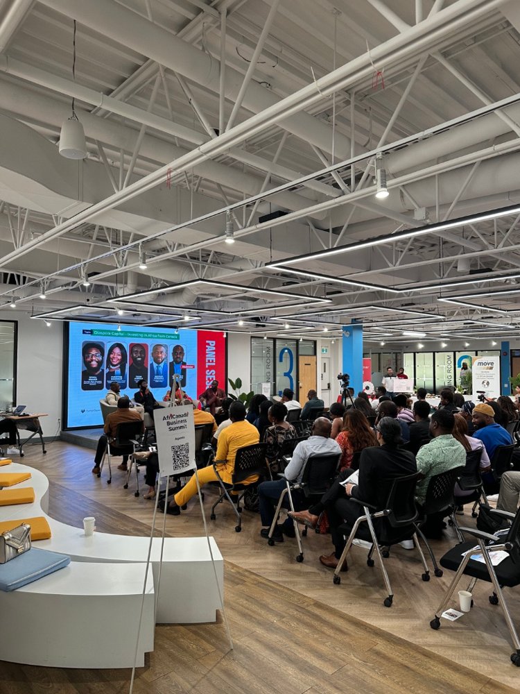 Attendees gathered for a panel discussion at the AfriCanada Summit